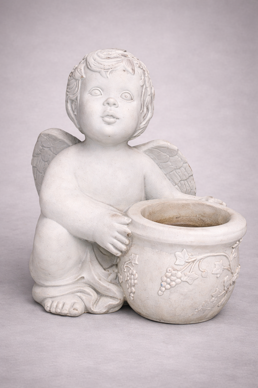Cherub with planter in hand